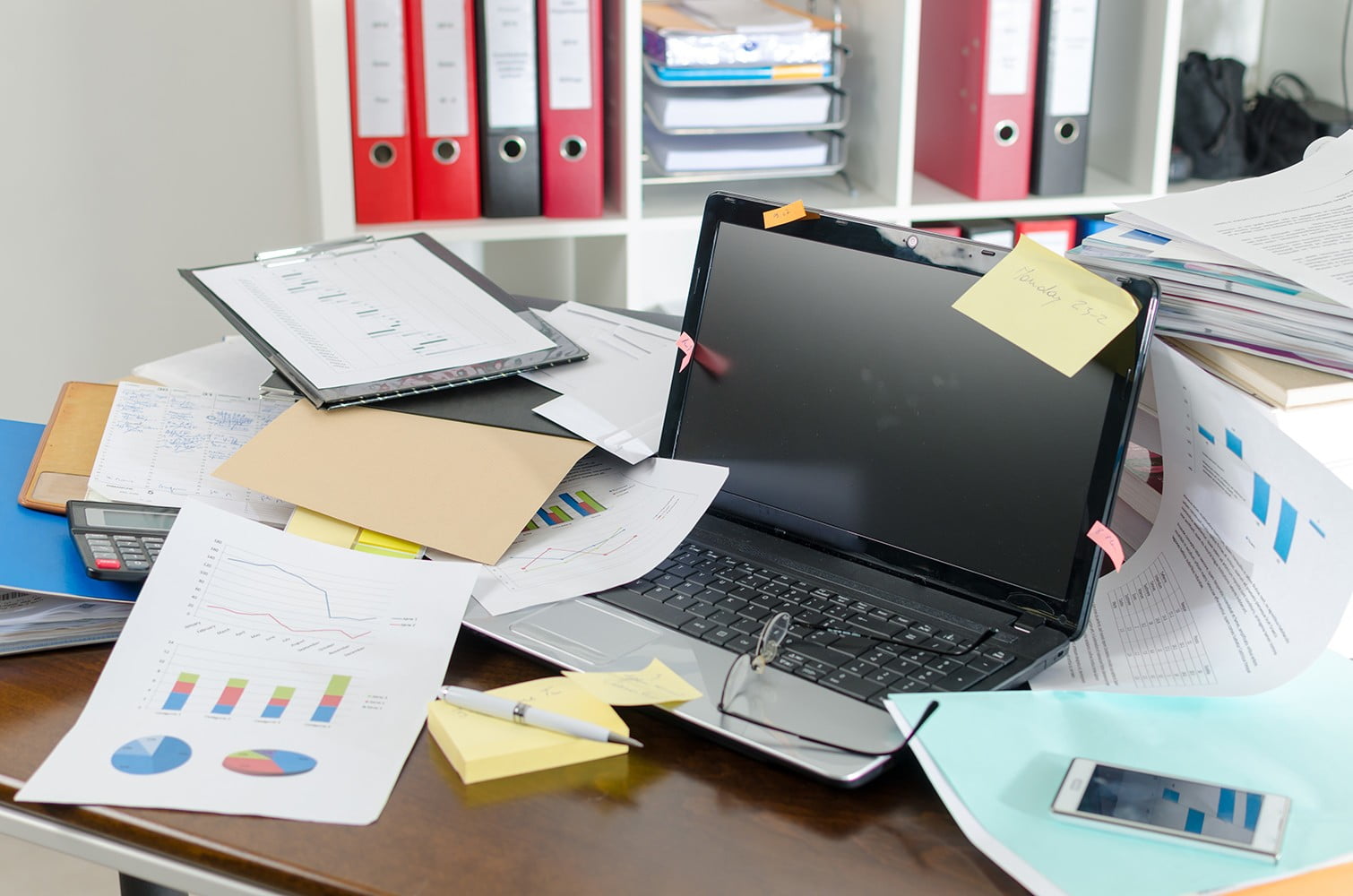 messy desk and computer