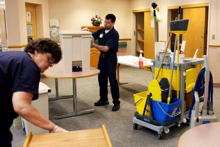 Janitors cleaning a medical facility