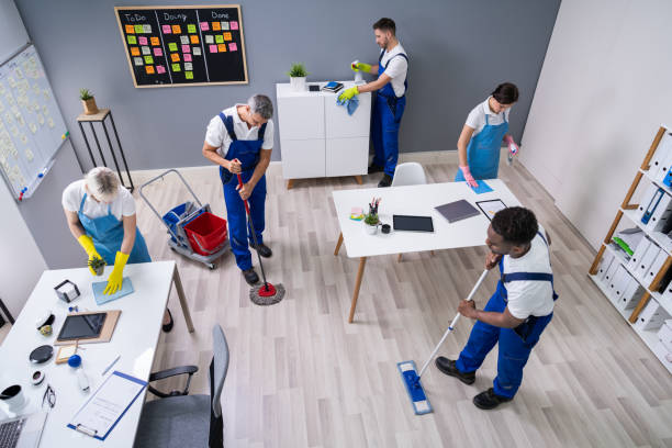 Staff cleaning an office