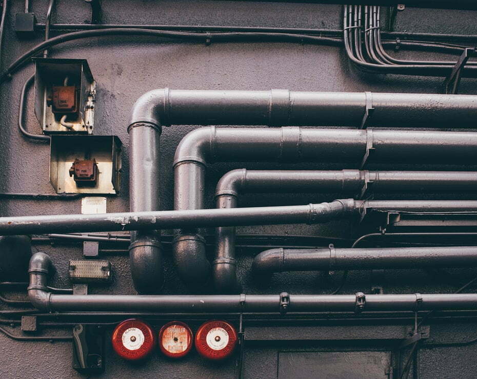 Industrial Pipes On A Wall
